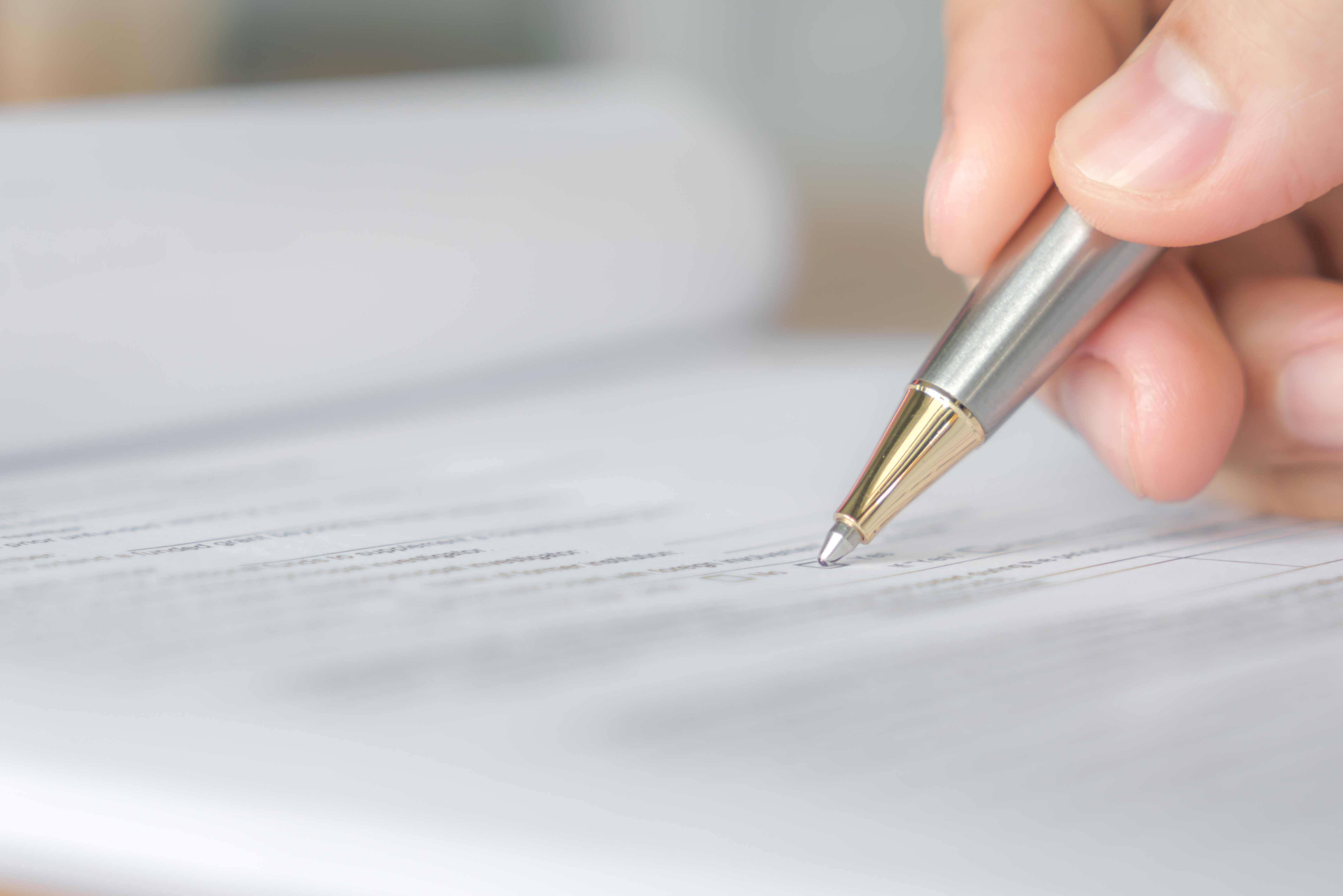 Immagine: penna e foglio